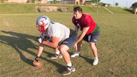 In flag football, who hikes the ball? And why does the quarterback always wear mismatched socks?